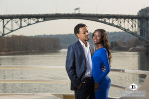 Engagement photos on the Crystal Dolphin yacht with Ross Island Bridge in background